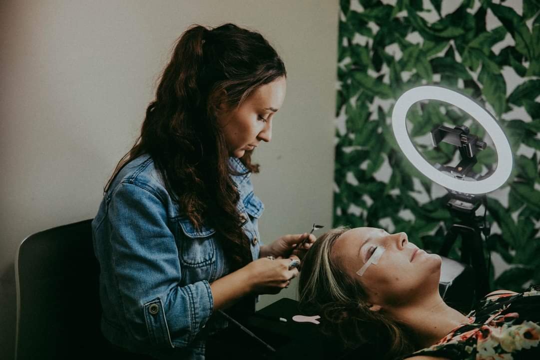Kat mapping brows at Junipermoon Esthetics