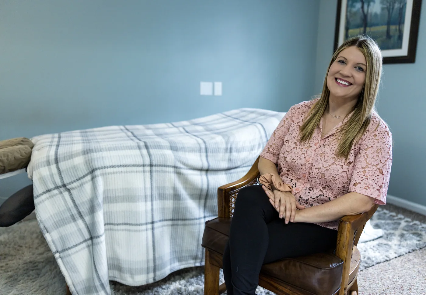 Kendyl in her calm massage treatment room at Brushed On Main