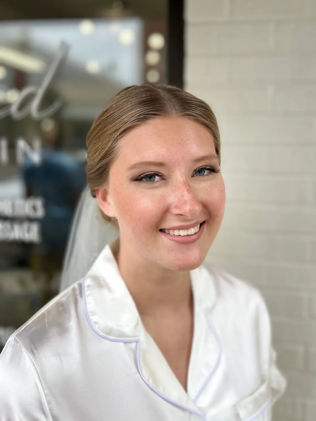 Soft glam bridal makeup with veil